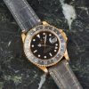 Rolex GMT-Master II 16718 - 18K Yellow Gold - Black Dial - Faded Bezel - Excellent Conditions